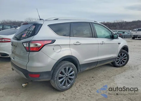 2017 Ford Escape Titanium z USA, uszkodzony, nr VIN 1FMCU0JDXHUE57577